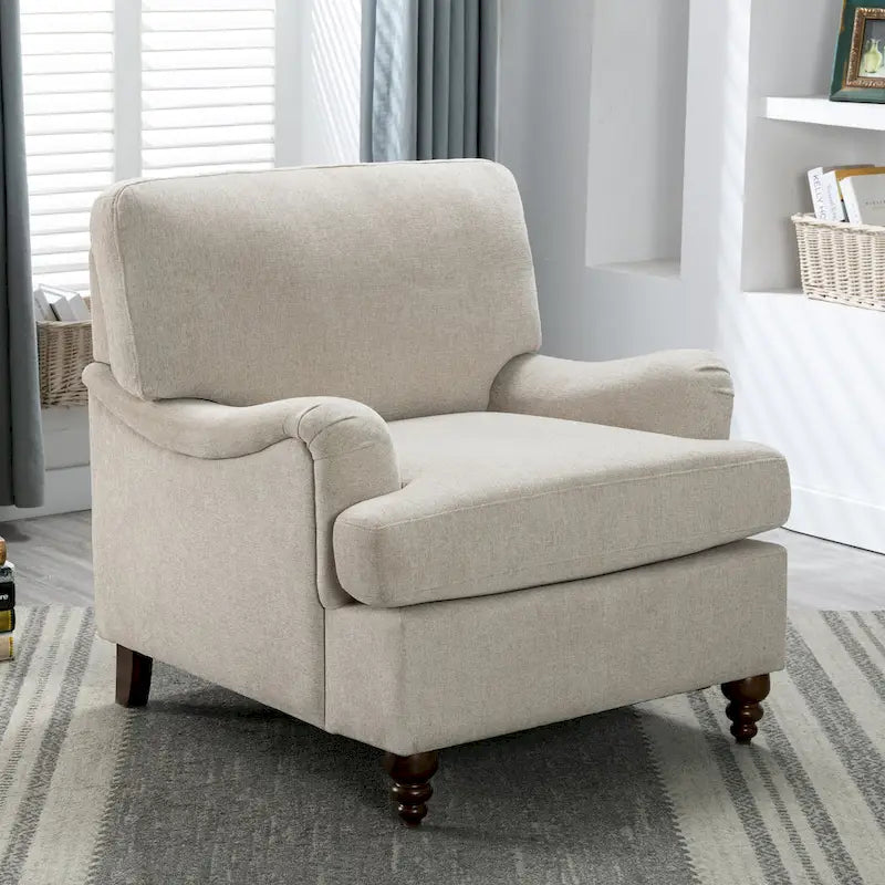 Fauteuil rembourré avec accoudoirs roulés et pieds en noyer tourné