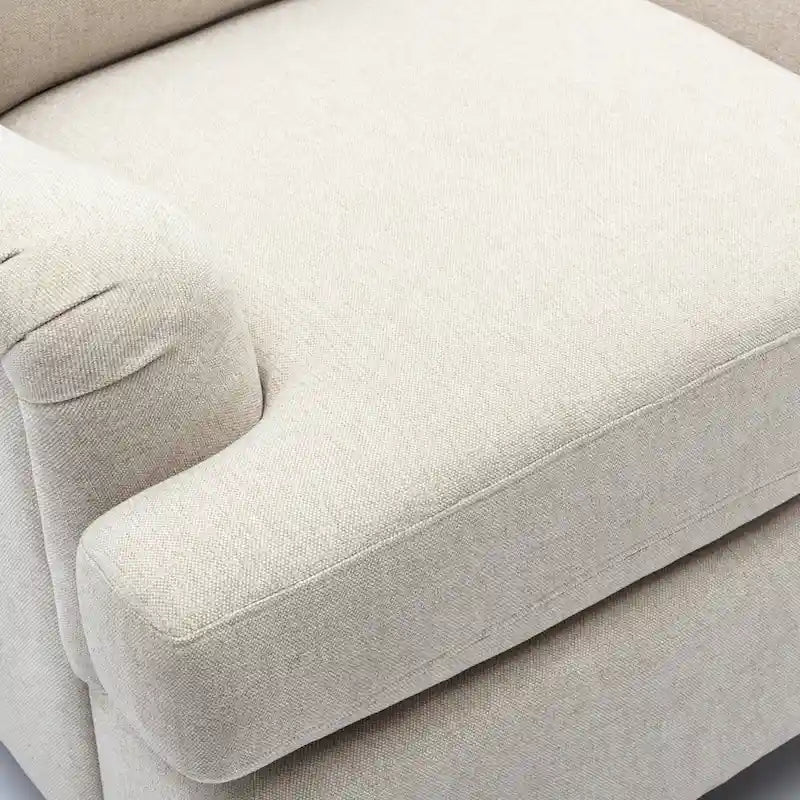 Fauteuil rembourré avec accoudoirs roulés et pieds en noyer tourné